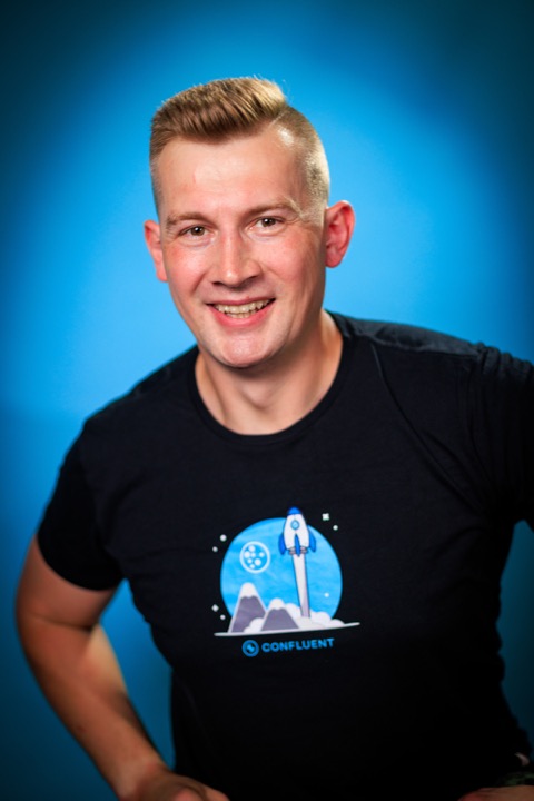 Studio portrait of Viktor Gamov on a blue background