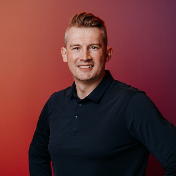 Viktor Gamov, smiling, three-quarter view