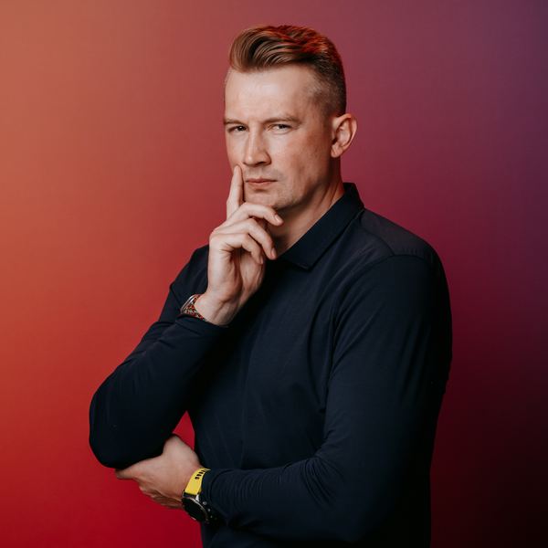 Viktor Gamov in a thoughtful pose, hand at chin